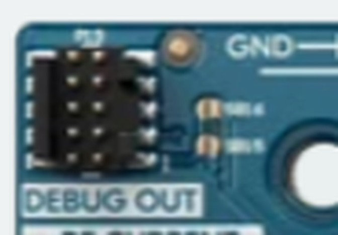 開發板上的 10-pin Arm Cortex Debug 排針，絲印標示 DEBUG OUT
